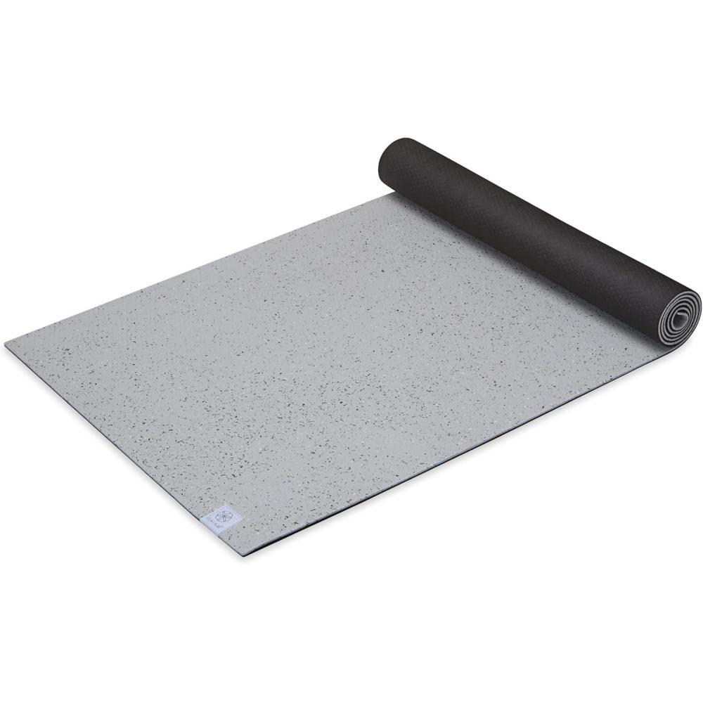 imageGaiam Recycled Hybrid Reversible Workout Mat 24 W x 68 L Black 6mm Thick Yoga Mat Made with 90 GRS Certified Recycled EVA Durable NonSlip Exercise Mat for Yoga Fitness and Home Workout