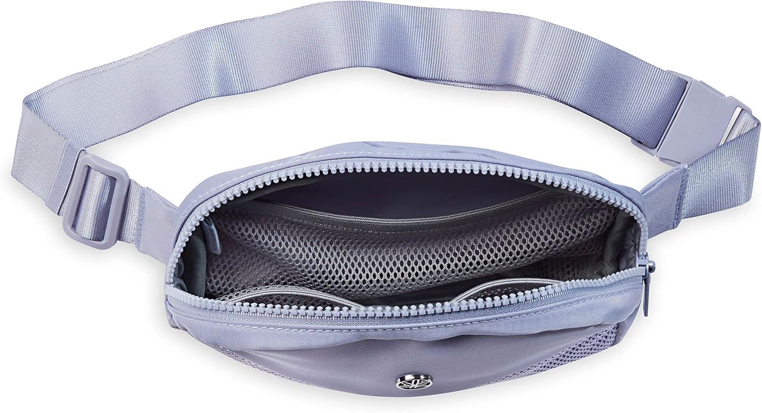 imageGaiam Go for It Waist Pack Adjustable Fanny Pack Crossbody Bags for Women ampamp Men Waterproof Cross Body Bag with Zippered Pockets Running Belt Bag Ideal for Vacation ampamp TravelDeep Thistle