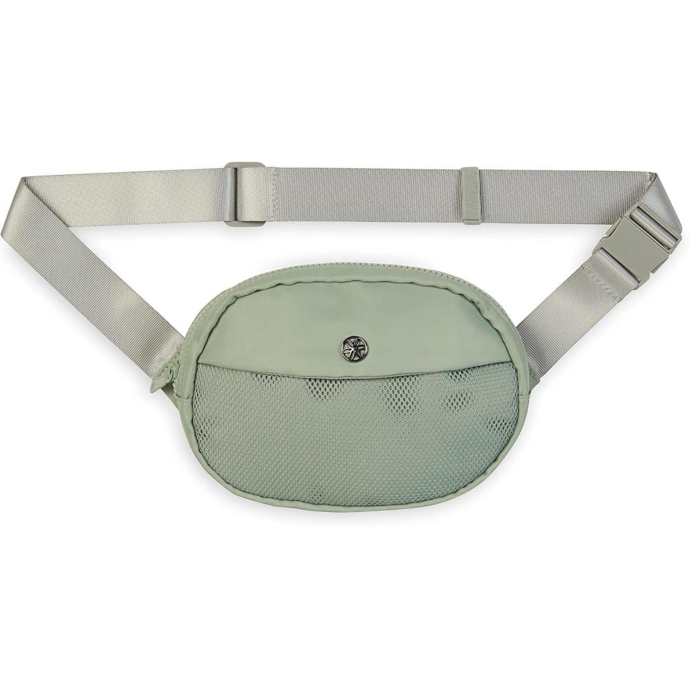 imageGaiam Go for It Waist Pack Adjustable Fanny Pack Crossbody Bags for Women ampamp Men  Waterproof Cross Body Bag with Zippered Pockets Running Belt Bag Ideal for Vacation ampamp TravelCelery